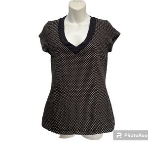 Express sleeveless top.  Black and cream Polk a dot. Size medium